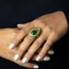 Bague réglable I cabochon de jade vert emeraude I argent massif doré à l'or 18 carats I Elliade Paris I vue portée I Label AÉ Paris